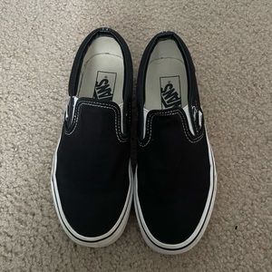 Vans black slip-on sneakers